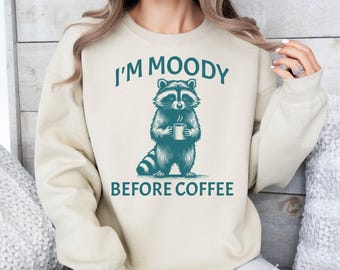 Moody Raccoon Coffee Sweatshirt: Funny Trash Panda Meme Shirt