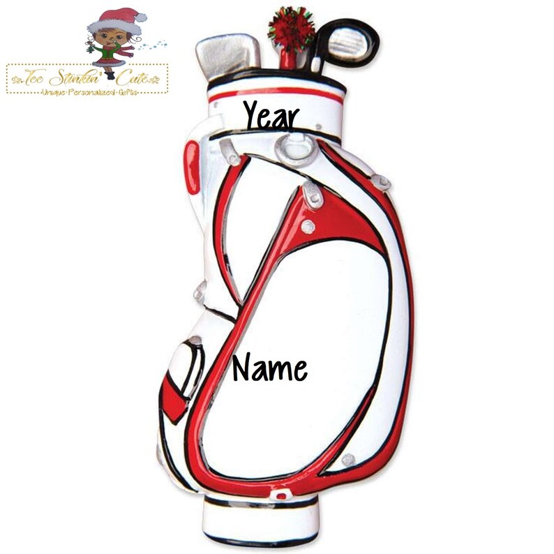 May include: A white and red golf bag ornament with the word "Year" at the top and "Name" in the center. The golf bag contains golf clubs and a red decorative accent. The ornament is a personalized gift.