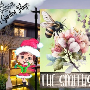 May include: A garden flag with a watercolor painting of pink flowers and a bee. The flag has a wooden sign at the bottom with the text "THE SMITHS" in white.