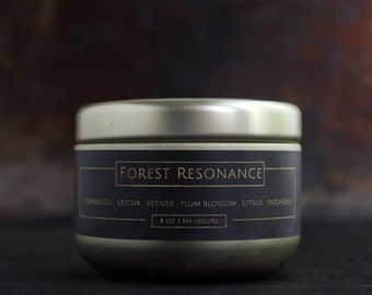 FOREST RESONANCE - Small Scented Candle In Gold Tin - Sweet + Earthy