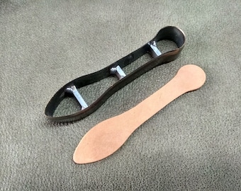 Cutter for cutting the strap of the bag