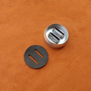 metal cutter with two oval holes