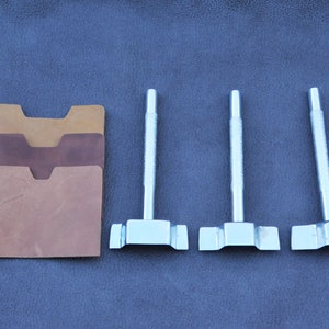 Set of manual punches for wallet pockets