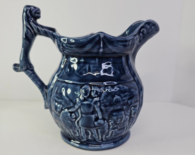 c.1920s Arthur Wood Blue Majolica Gladiator and Lions Relief Milk Pitcher Jug