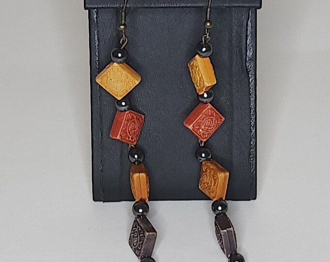 Vintage Hematite Beads and Yellow, Red, Orange, and Gray Diamond-Shaped Plastic Beads with Symbol Dangle Earrings A-9-88