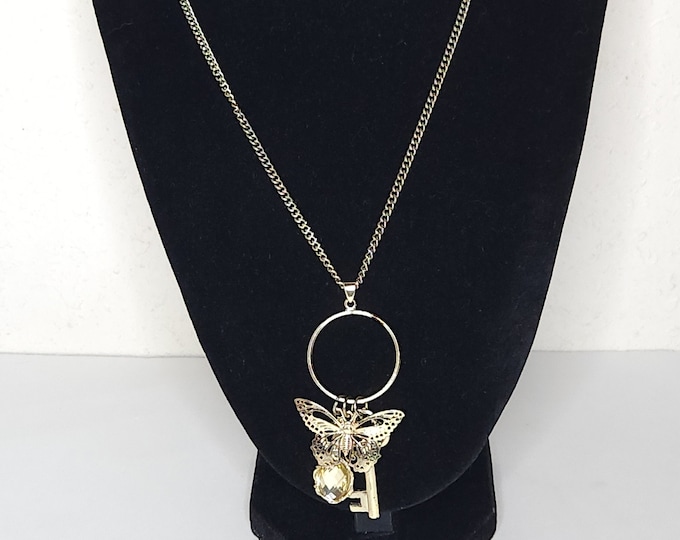 Vintage Gold Tone Ring Pendant with Mirror, Butterfly and Key Dangle Charms Necklace C-5-90