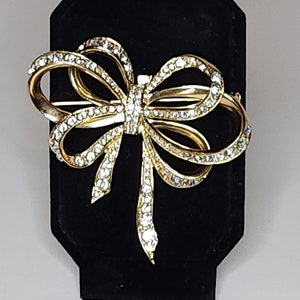 Vintage Kenneth Jay Lane for Avon Marked Gold Tone Bow with Clear Rhinestones Brooch Pin A-3-50-RRH