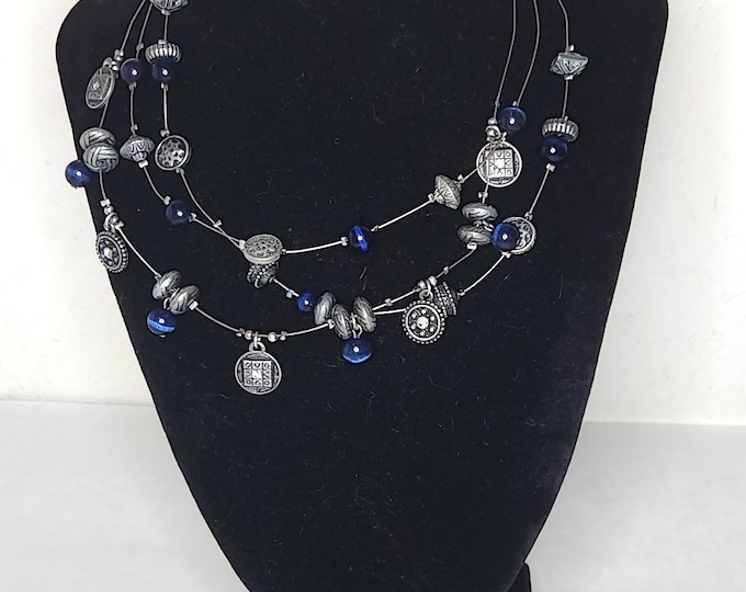 Vintage Silver Tone, Blue Tiger's Eye, and Black Plastic Stationed Beads on Three Strands of Silver Tone Wire Necklace B-8-89