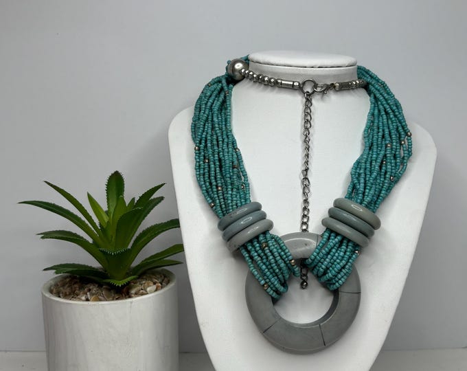 Faux Turquoise Seed Bead Multi Strand with Plastic Detail/Rings and Silver Tone Findings 23” to 29” Necklace D-8-86