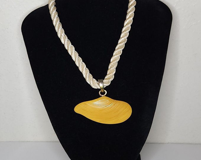 Vintage Yellow Bakelite "Shell" Pendant on Cream Rope Necklace D-2-54