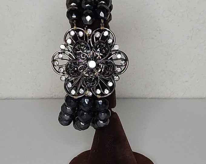 Vintage Silver Tone Flower and Three Strands of Gunmetal Tone Plastic Faceted Beads Stretch Bracelet C-1-60