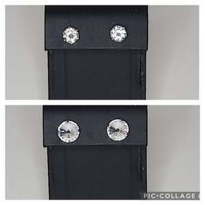May include: Two pairs of silver stud earrings with clear round rhinestones on a black display card.