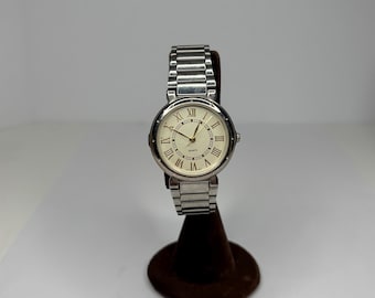 Vintage Avon Sliver-Tone Watch with Gold Accented Face D-7-27