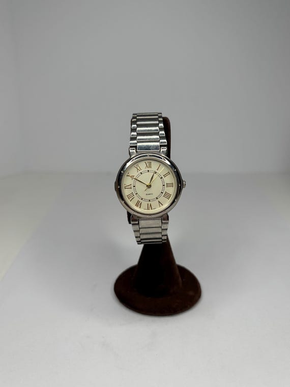 Vintage Avon Sliver-tone Watch With Gold Accented Face D-7  display picture 1