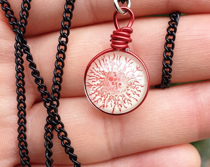 Red and white small glass pendant by Maria Marachowska