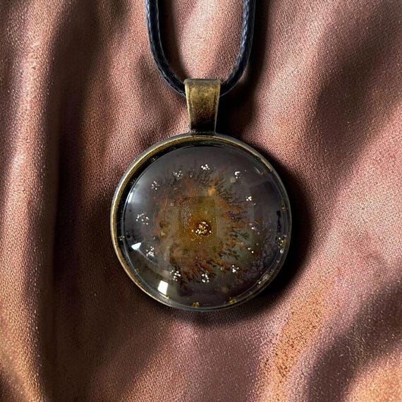 Dark brown unisex pendant by Maria Marachowska