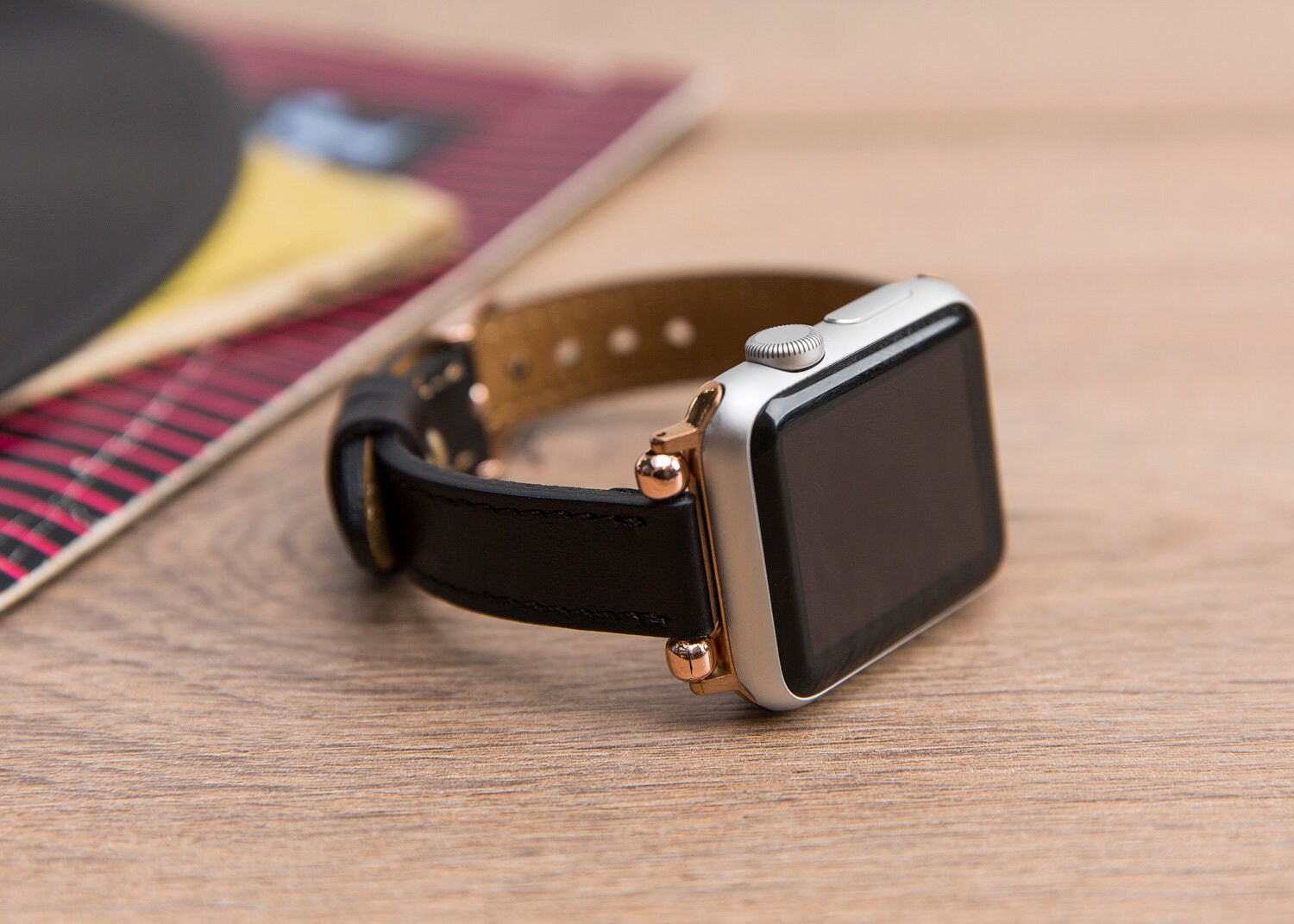 rose gold with black band apple watch
