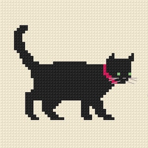 May include: A cross-stitch pattern of a black cat with a pink collar and green eyes. The cat is depicted in a pixelated style, standing in profile with its tail raised high, set against a light cream-colored fabric background with a grid texture.