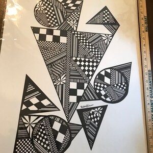 May include: Black and white abstract geometric art print with a variety of shapes and patterns, including circles, triangles, and squares. The print is signed "Brittany Glenn" in the bottom center.
