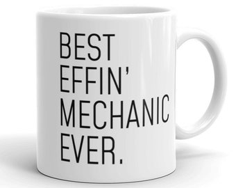 May include: White ceramic coffee mug with black text that reads "BEST EFFIN' MECHANIC EVER."