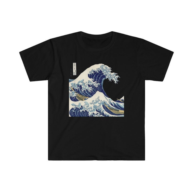 May include: Black t-shirt with a graphic print of a large blue wave crashing over a boat. The wave is depicted in a traditional Japanese style.