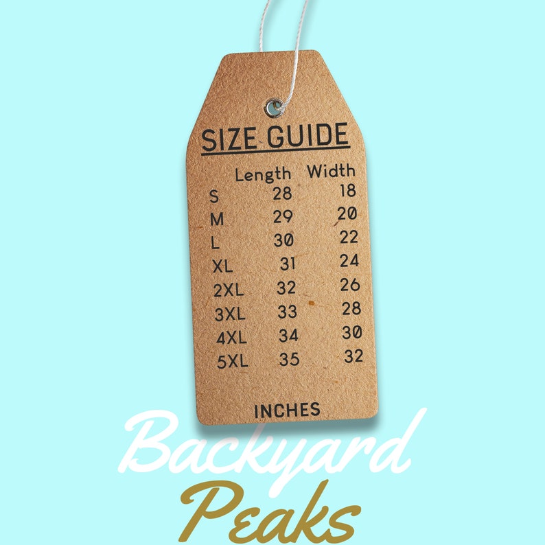 May include: A brown paper size guide tag with the text "SIZE GUIDE" and a chart listing sizes S through 5XL with corresponding length and width measurements in inches. The tag is labeled "Backyard Peaks" in gold lettering.