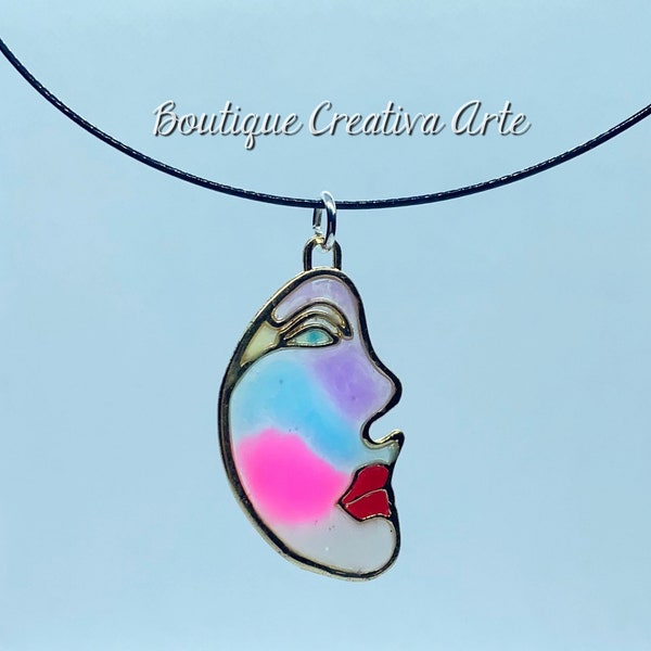 Resin necklace with Cubist-style face