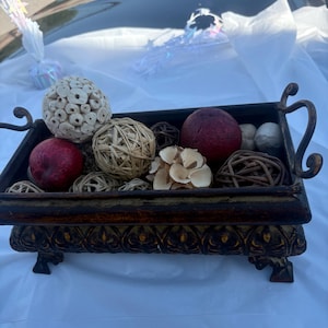 decorative rectangular footed metal or resin tray.