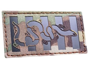 Toppa tagliata al laser di Benjamin Franklin, con strisce ribelli e scritta "Join or Die" (Unisciti o muori), formato 2"x3,5" (5x8,9 cm).
