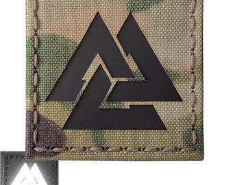 May include: Black and white patch with a triangular symbol, the Valknut, on a camouflage background. The patch is sewn with brown thread.