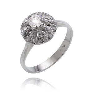 Estate 18KT White Gold .27 Carat Solitaire Diamond Circular Ring.