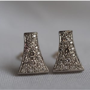 Estate solid Platinum vintage converted Diamond earrings.