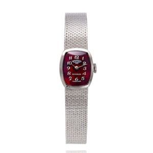 Montre-bracelet TAVERNIER INCABLOC pour femme en or blanc 18 carats, fabrication suisse.