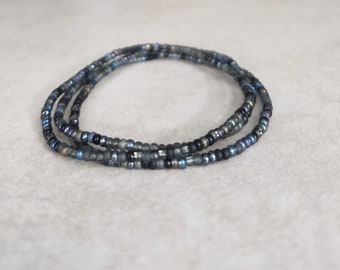 11/0 Midnight Set of 3 Tiny Stretch Stackable Seed bead bracelet set, shades of black, dark grey, and dark purple/blue iris hue.