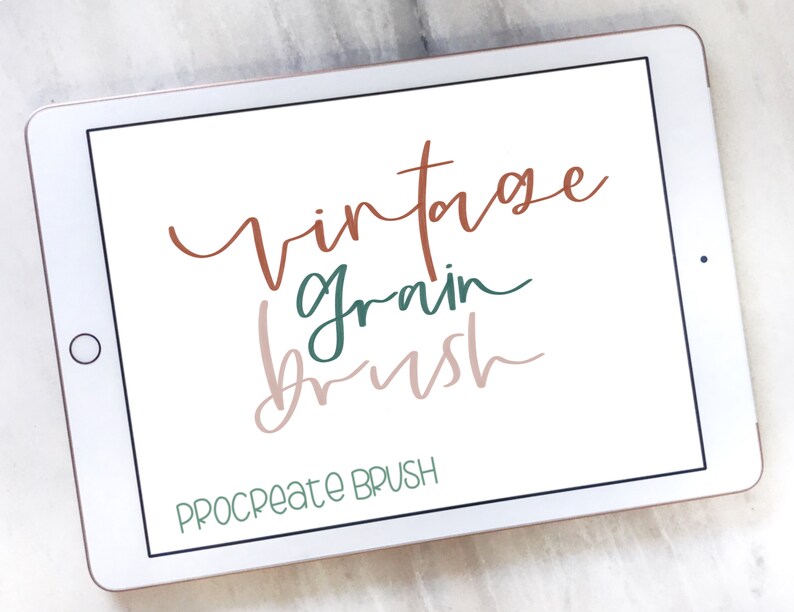 May include: A white tablet screen displaying the text "vintage grain brush" in brown, green, and pink lettering. The text "Procreate Brush" is displayed in green at the bottom of the screen.