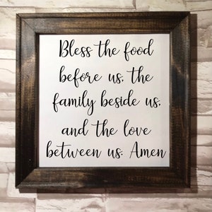Bless the food in front of us the family beside us and the love between us Amen framed canvas- home decor