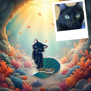 May include: A whimsical enamel pin featuring a black cat with a teal mermaid tail, set against an underwater scene with coral and fish. A photo of a black cat is in the upper right corner. The pin is a unique accessory.