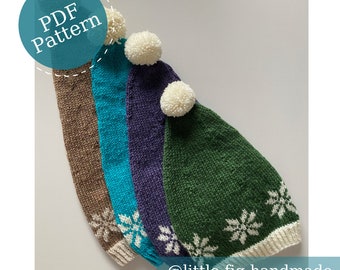 May include: Four knitted winter hats in brown, teal, purple, and green, each with a white pom-pom and snowflake design. The hats are handmade, with the text "PDF Pattern" and "@little.fig.handmade" visible.