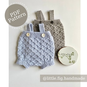 May include: PDF pattern for knitting baby overalls. Two pairs of overalls are shown, one in light blue and one in brown. The overalls have a diamond pattern and are knitted with buttons.