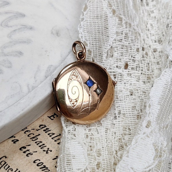 Antique Edwardian locket, gold plated with blue glass stone and pearl