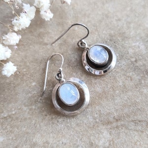 Silver earrings with moonstones