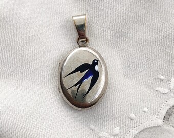 Antique Art Nouveau silver plated metal and enamel swallow locket, bird locket, bird design