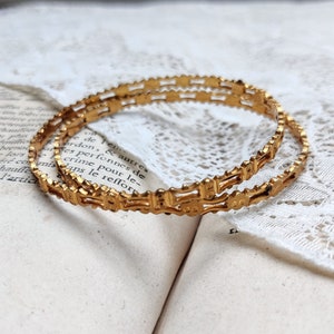 Antique gilt metal bangle bracelets