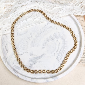 Halskette aus goldfarbenem Metall im Vintage-Stil