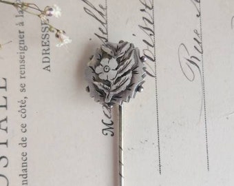 Antique silver stick pin flower