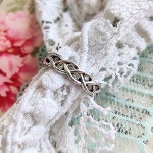 Silver ring with clear glass stones