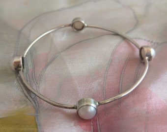 Zilveren rush armband met vier witte parels