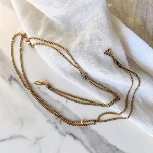 Antique Victorian/Edwardian gold-tone metal long guard / muff chain necklace