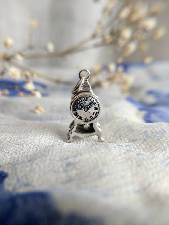 Small silver clock pendant / charm - image 1