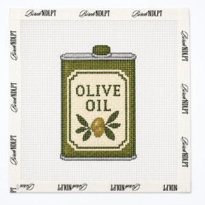 May include: A needlepoint canvas featuring a rectangular olive oil tin design in shades of olive green, cream, and gold. The center displays the text OLIVE OIL above a single olive with leaves. The border is printed with the text Birch NDLPT.